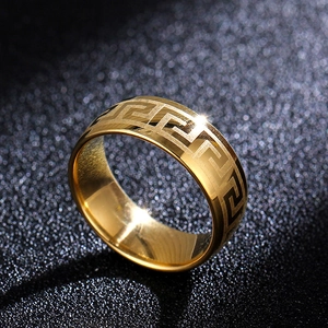 8mm gold 316L stainless steel ring featuring an embossed Greek key pattern design