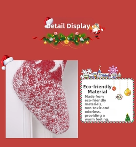 Detailed close-up of the eco-friendly red and white knitted wool Christmas stocking texture