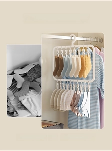 Multi-clip drying rack for socks and small items showing neat closet organization storage