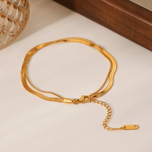 Detail of 18K gold plated stainless steel layered snake and bead chain with clasp