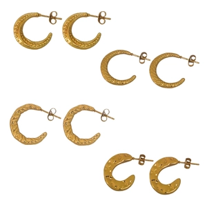 Set of four gold C-shaped stainless steel earrings with varied textured finishes