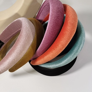 Padded velvet wide headbands in assorted colors including pink gold purple and teal