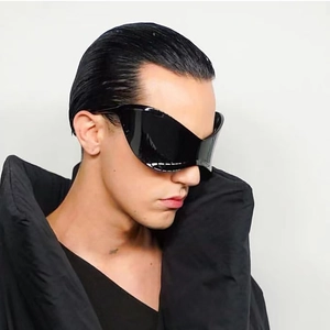 Futuristic Y2K wrap-around sunglasses in black, sleek sporty punk shield style for women