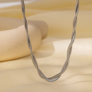 Macro close-up showing the intricate texture of silver double layered snake chain necklaces