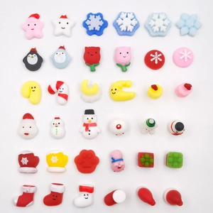Detail view of colorful TPR squishy Christmas toys including Santa and snowmen