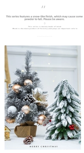 Close-up of frosted mini Christmas trees with pine cones and rustic burlap bases