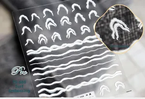 Detail of TS-688 3D embossed wave nail stickers with realistic white foam textures