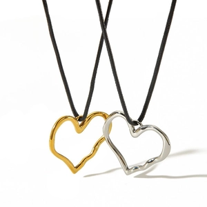 Minimalist stainless steel hollow heart necklaces in gold and silver with black cords