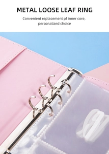 Pink loose-leaf binder detail with a durable 6-hole metal ring and clear PVC storage pocket