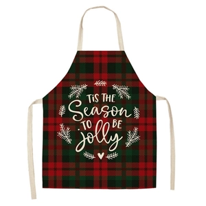 Christmas apron with red and green plaid pattern and seasonal festive text print