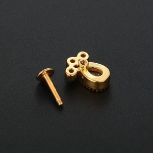Golden stainless steel flat back labret stud with U-shaped internally threaded piercing top