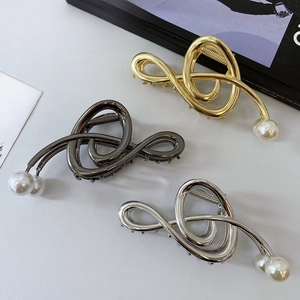 Three-piece metal hair claw clips with pearls in gold, silver, and black finishes