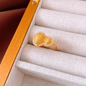 Luxurious gold gourd ring with matte brushed finish and sparkling zircon halo