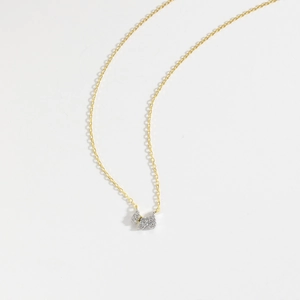 Elegant gold necklace with a sparkling terrier puppy silhouette pendant and zircon inlay