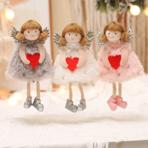 Three plush angel Christmas tree ornaments in grey, white, and pink with red hearts