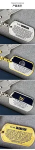 Detailed view of engraved stainless steel dog tag keychains in gold and silver finishes