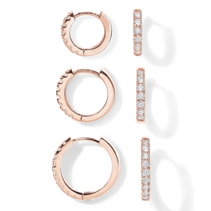 Detailed set of three rose gold huggie hoop earrings with micro-pave cubic zirconia stones