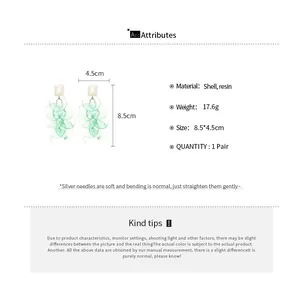 Size chart showing dimensions 8.5x4.5cm for long shell and resin fringe earrings