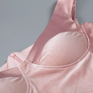 Detail of pink velvet and silk off-shoulder dress with invisible zipper and stitching