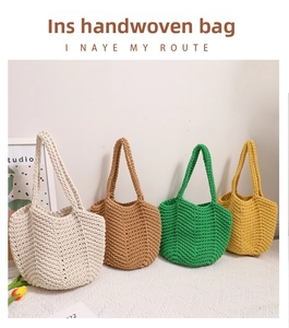 Detail showing V-shaped crochet texture on handmade knit shoulder bags in four colors