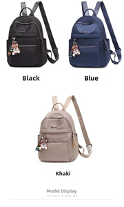 Detailed view of durable oxford fabric backpacks in black, blue, and khaki colors