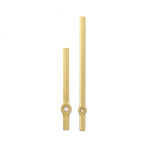 Minimalist gold metal clock hands set with hour and minute needles for watch movement