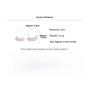 Detailed view of silver hoop earrings with metallic tassel and product dimensions info