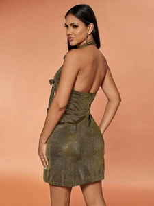 Sexy backless halter dress in gold glitter fabric with a sleek bodycon fit for women