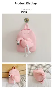 Detail view of pink plush toddler backpack featuring 3D flamingo doll and HSLP embroidery