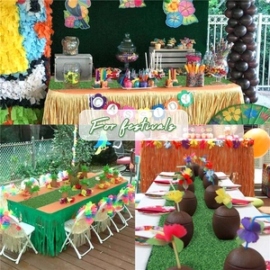 Close-up of tropical grass table runner and raffle skirt for festive party decoration