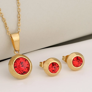 Minimalist gold stainless steel jewelry set with round red gemstone pendant and earrings