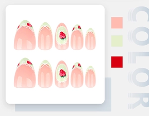 Detail view of 10-piece almond press-on nails with strawberry design and lace patterns