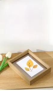 Detail of light wood A4 photo frame with double-sided transparent acrylic for specimens