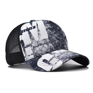 Fashionable mesh baseball cap with vintage black and white street art print on the brim