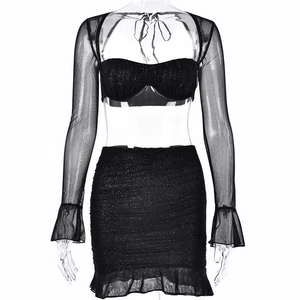 Detail of sexy black mesh two-piece set with square neck flared sleeves and ruffles