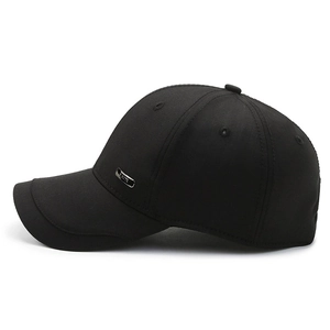 Classic black men's baseball cap with rectangular silver metal brand emblem on side