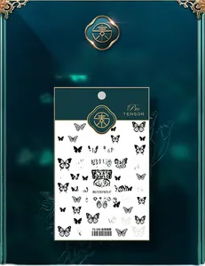 Detailed view of TS-390 white night butterfly nail stickers on dark green vintage background