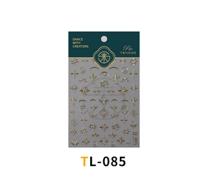 Détail des autocollants 5D dorés pour ongles avec motifs de soleil lune et étoiles