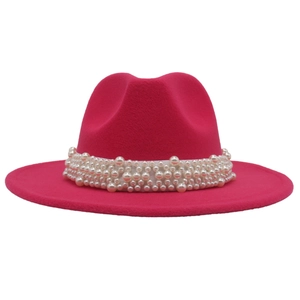 Detailed view of the rose red fedora hat featuring multi-layered faux pearl band trim