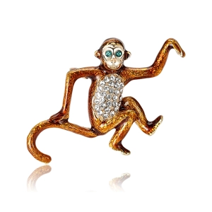 Creative enamel monkey brooch with sparkling rhinestones and green gemstone eyes