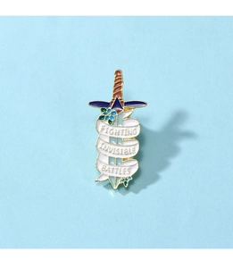 Detailed enamel pin of a sword with Fighting Invisible Battles banner on blue background