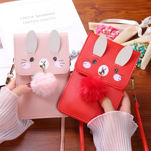 Minimalist crossbody phone bag with cute rabbit ears and pom-pom charms in pink and red