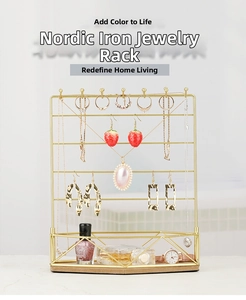 Detail of golden iron jewelry display stand with multi-layer bars and sphere hooks