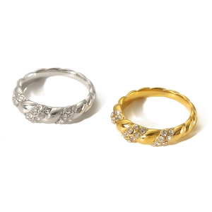 Minimalist twisted 18k gold and silver rings with pave diamonds for women