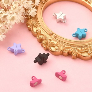 Detailed close-up of a star-shaped magnetic clasp for jewelry DIY in assorted colors