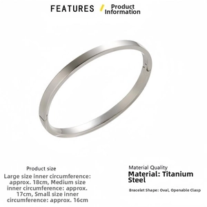 Detail view of oval titanium steel bracelet with snap closure in various sizes