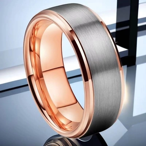 Macro view showing brushed silver surface and polished rose gold interior of the ring