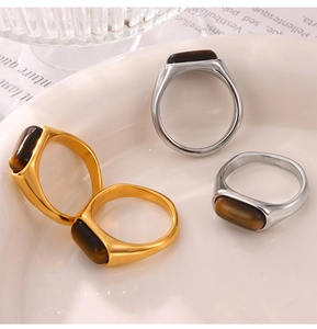 Detail von Vintage 18k Gold und Silber Titanringen mit braunem Tigerauge-Stein Inlay