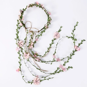 Bohemian floral rattan headband with pink artificial flowers and long trailing vines