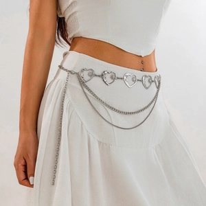 Close-up of silver layered heart waist chain with solar patterns and double metal fringes